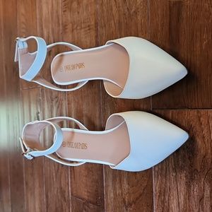 Closed toe white bridal heels